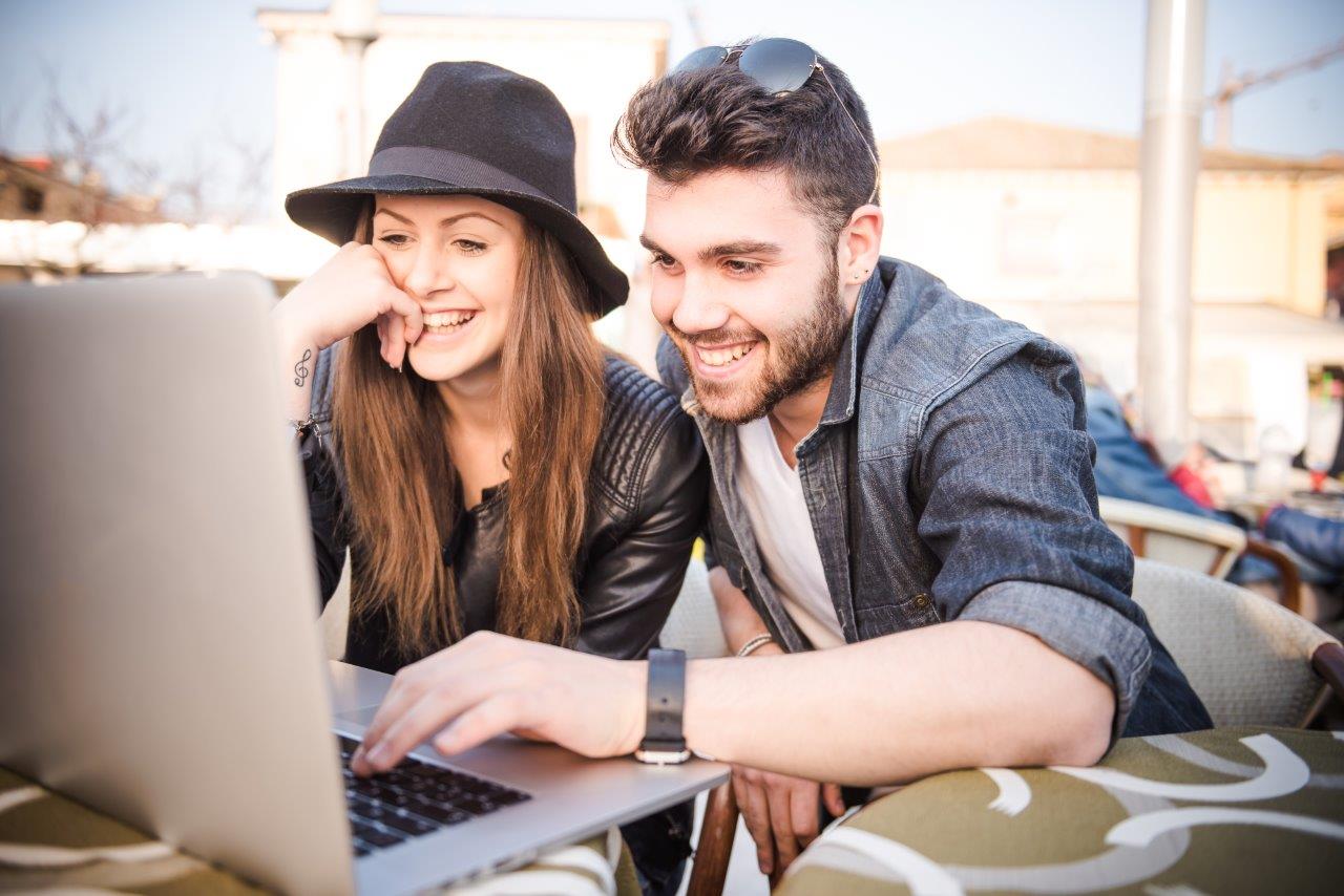 couple looking at laptop
